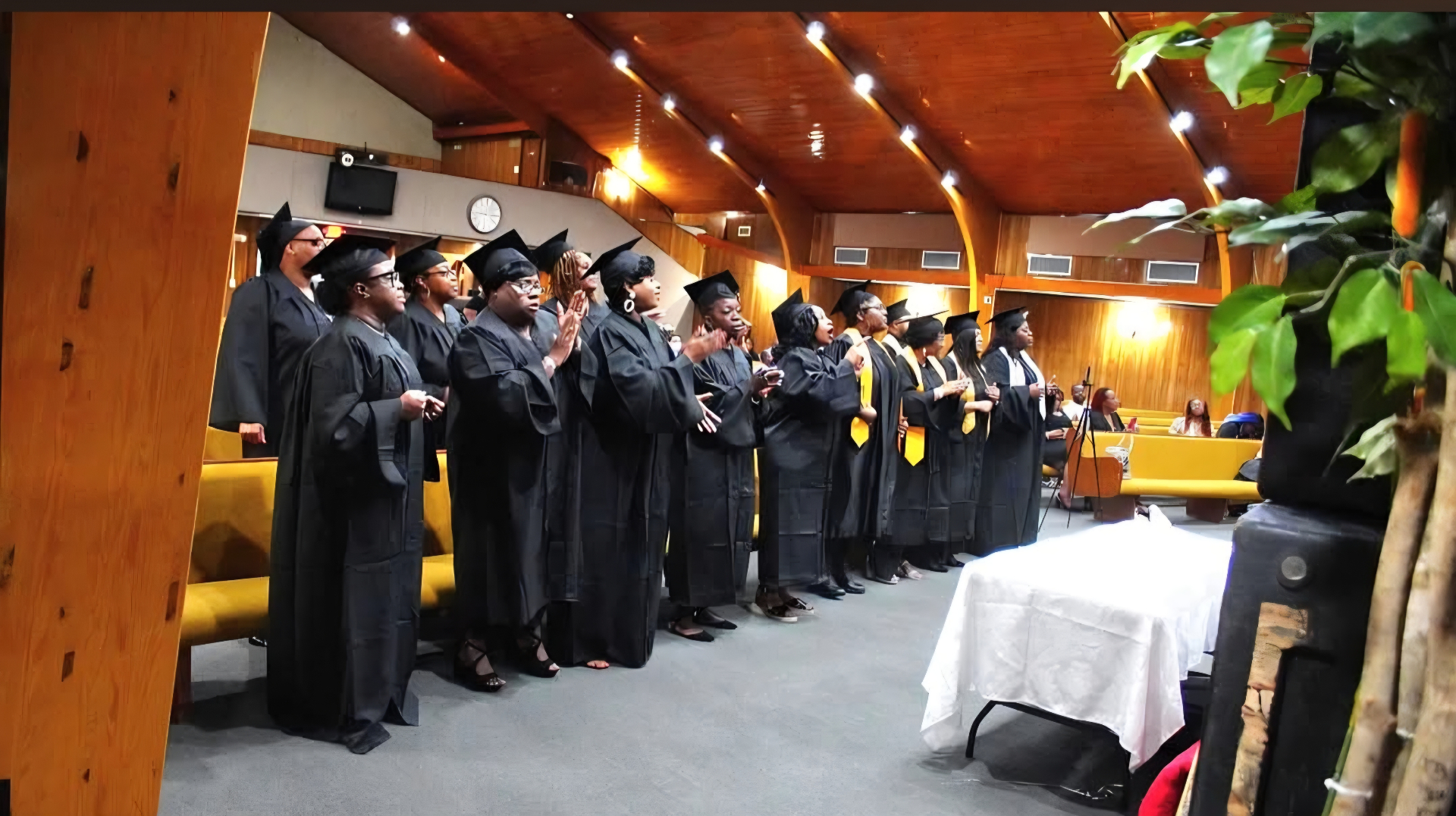 CALA graduating class standing in worship