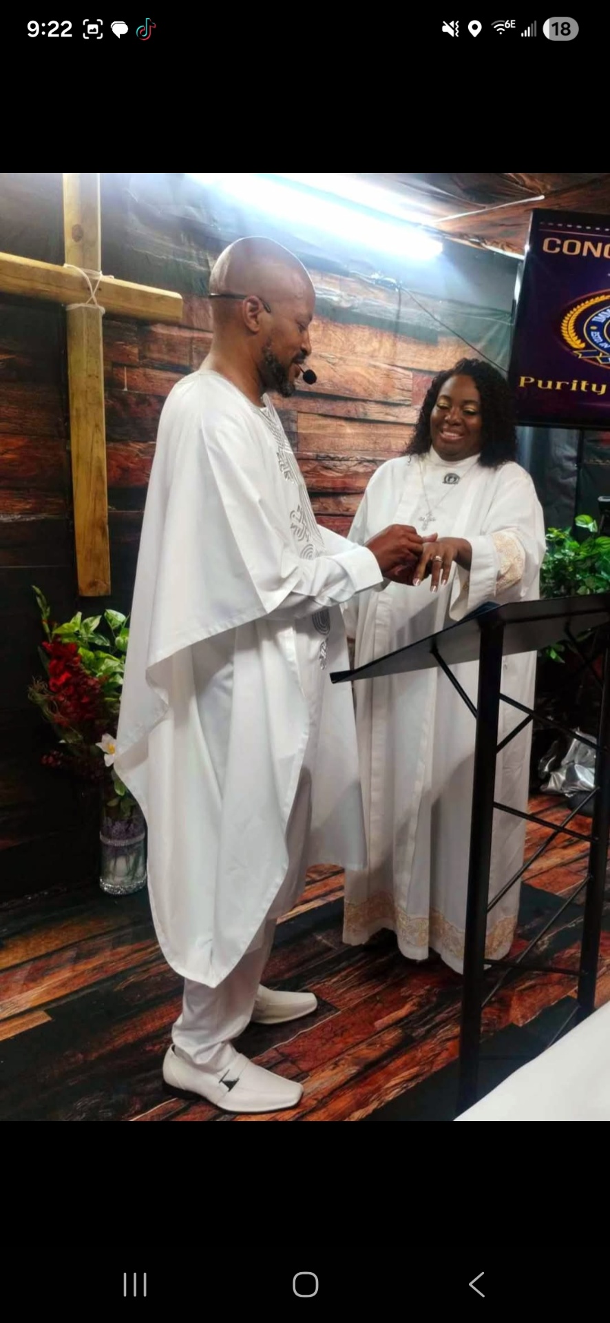 Pastor exchanging rings during anniversary purity ceremony